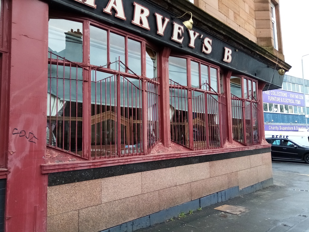 pub wall with three bay windows