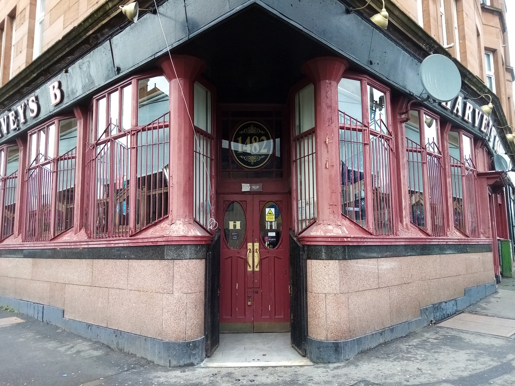 deeply recessed corner entrance to pub