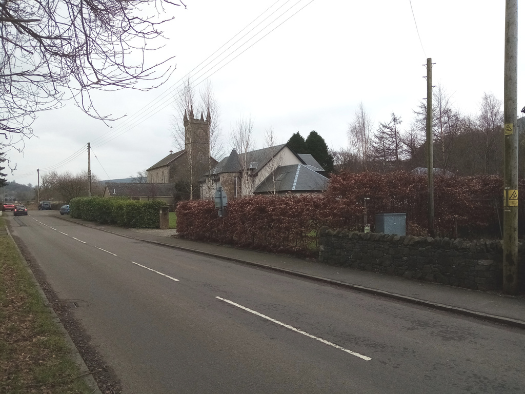 closer view of the church tower and its four
     pinnacles